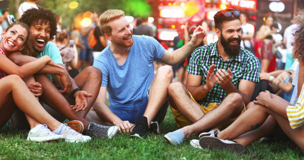 friends gathering before the concert. - concert stock pictures, royalty-free photos & images