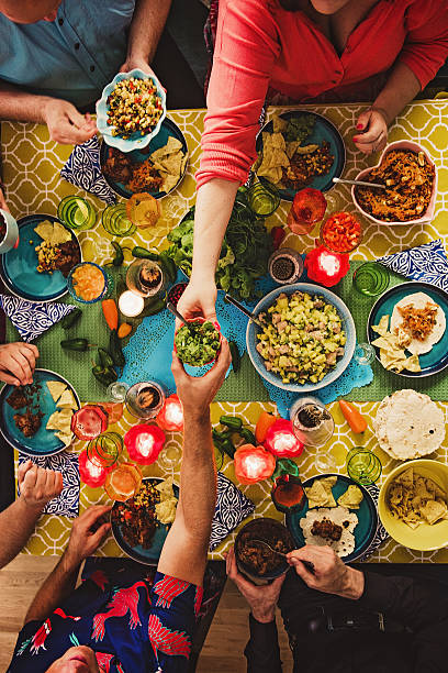 friends having a mexican tex mex dinner - food stock pictures, royalty-free photos & images