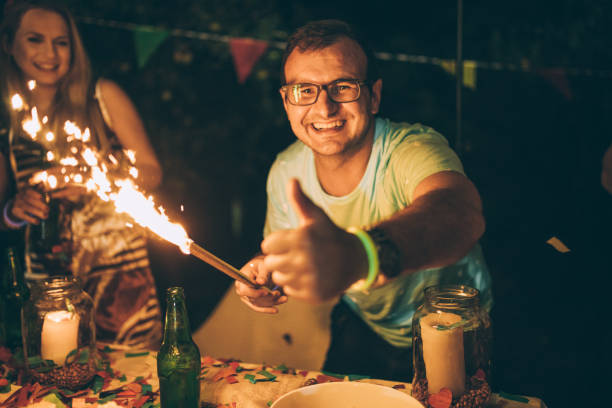 friends having a party - garden decoration stock pictures, royalty-free photos & images