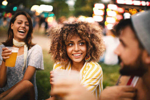 friends having fun at concert. - concert stock pictures, royalty-free photos & images