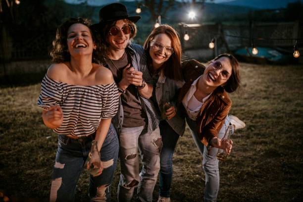 friends having fun in back yard - garden decoration stock pictures, royalty-free photos & images