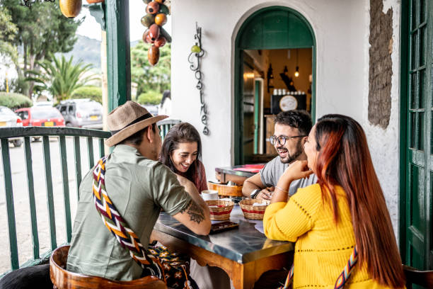 friends talking while eat at a coffee shop - food stock pictures, royalty-free photos & images