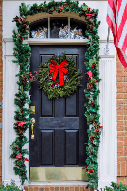 front entrance of house adorned with christmas decor - home decoration stock pictures, royalty-free photos & images