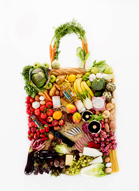 fruit and vegetables in shape of shopping bag - food stock pictures, royalty-free photos & images