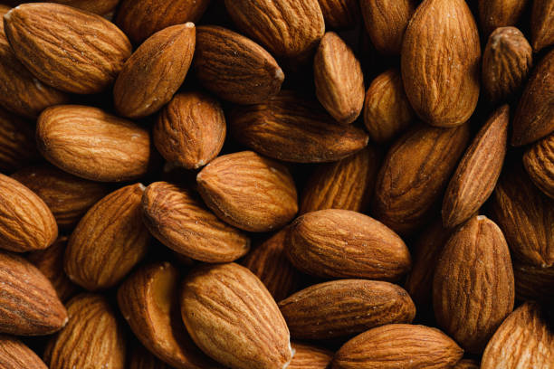 full frame of almonds - food stock pictures, royalty-free photos & images