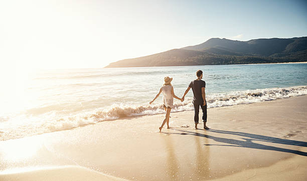 gönnen sie sich ein strand-urlaub - travel stock-fotos und bilder