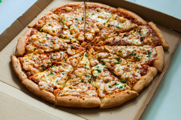 garlic shrimp pizza - junk food stock pictures, royalty-free photos & images