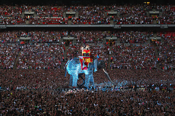 Gary Barlow, Jason Orange, Howard Donald and Mark Owen of 'Take That' perform onstage for their 'Circus' tour held at Wembley Stadium on July 1, 2009...