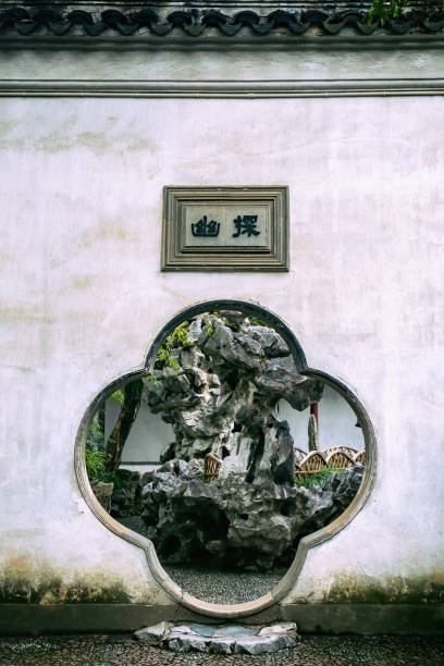 gate of the lion park in suzhou garden, china - garden decoration stockfoto's en -beelden