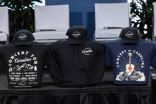 General view is seen of merchandise for the Concert for Carolina at Bank of America Stadium on October 26, 2024 in Charlotte, North Carolina.