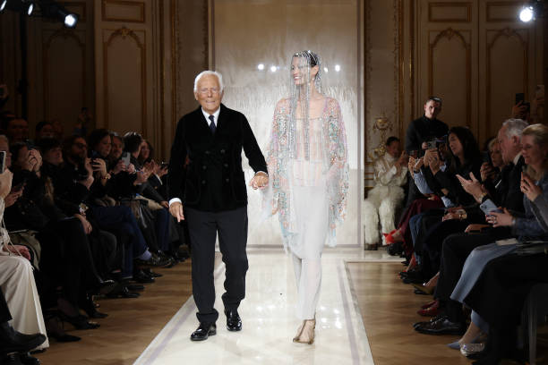 Giorgio Armani acknowledges the applause of the audience during the Giorgio Armani Privé Haute Couture Spring-Summer 2025 show as part of Paris...