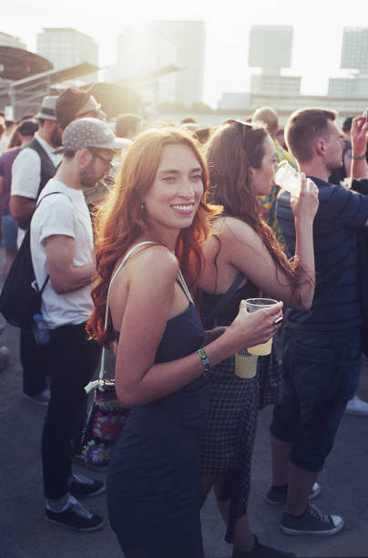 girl at a festival - concert stock pictures, royalty-free photos & images