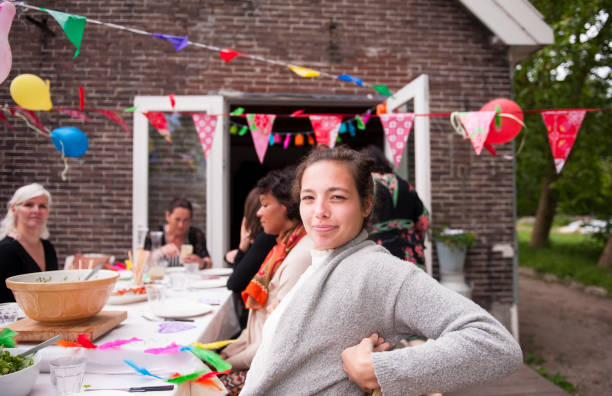 girls and women at a birthday dinner party - garden decoration stock pictures, royalty-free photos & images