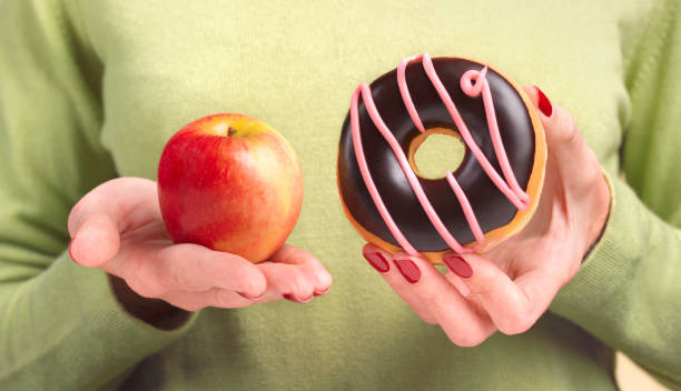 good food bad food - junk food stock pictures, royalty-free photos & images