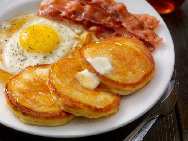 grand slam breakfast - pancakes, bacon and eggs - food stock pictures, royalty-free photos & images