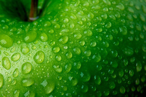 green apple detail - food stock pictures, royalty-free photos & images