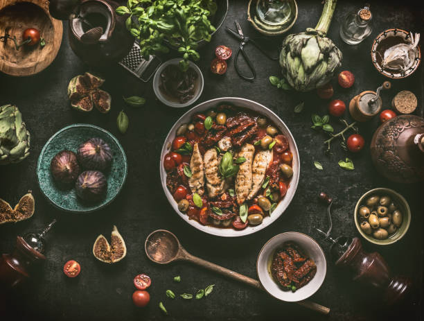 grilled chicken breast with mediterranean ingredients sauce - food stock pictures, royalty-free photos & images