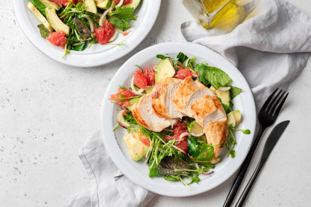 grilled chicken salad with avocado - food stock pictures, royalty-free photos & images
