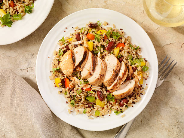 grilled chicken with quinoa and brown rice salad - food stock pictures, royalty-free photos & images