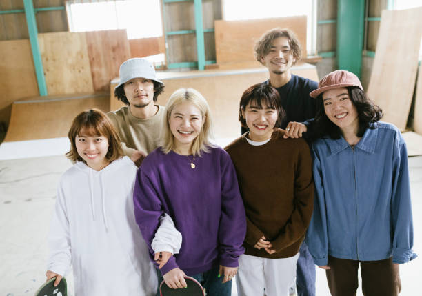 group of skateboarders - fashion stock pictures, royalty-free photos & images