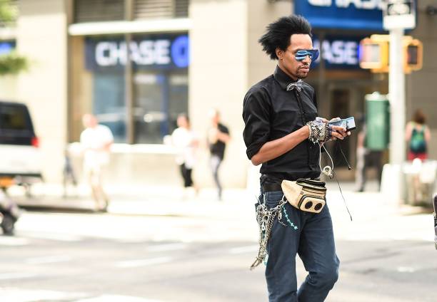 Guest is seen wearing a fanny pack outside the Matiere show during New York Fashion Week: Men's S/S 2018 at Skylight Clarkson Sq on July 12, 2017 in...