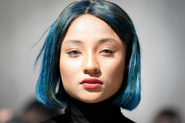 Guest with blue hair is seen at the Hera Seoul Fashion Week 2019 F/W at Dongdaemun Design Plaza at Dongdaemun Design Plaza on March 22, 2019 in...