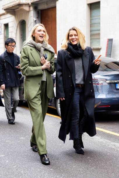 Guests are seen wearing on the left black sunglasses, a white shirt, a blue silk mini scarf, pink and purple polka dots printed foulard and a blue...