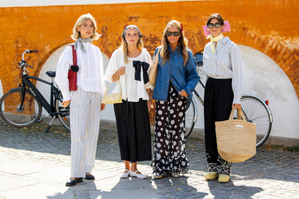 Guests outside Skall Studio during day three of the Copenhagen Fashion Week SS25 on August 07, 2024 in Copenhagen, Denmark.