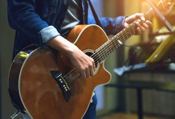 guitarist on stage for background, soft and blur concept - concert stock pictures, royalty-free photos & images