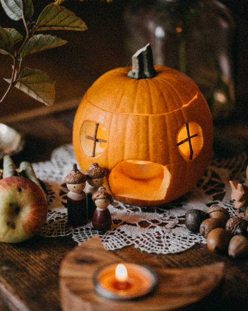 halloween set up on a wooden dining table - home decoration stock pictures, royalty-free photos & images