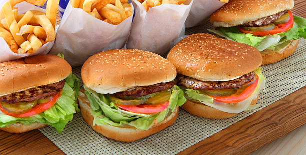 hamburgers - junk food stock pictures, royalty-free photos & images