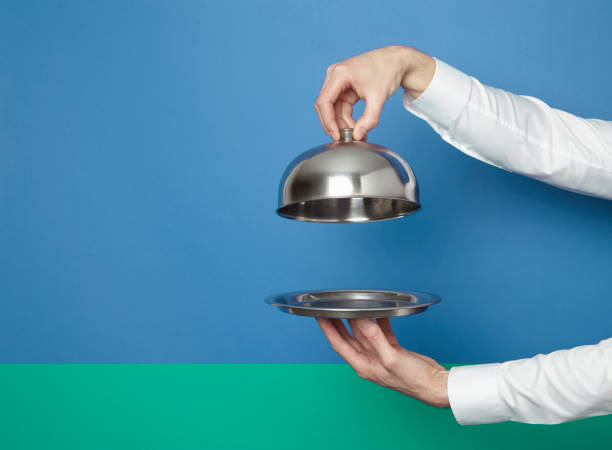 hands holding silver tray and lid - food stock pictures, royalty-free photos & images