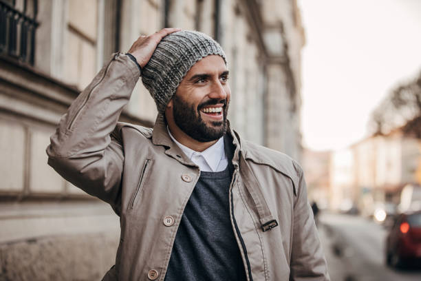 handsome fashionable man on the street - fashion stock pictures, royalty-free photos & images