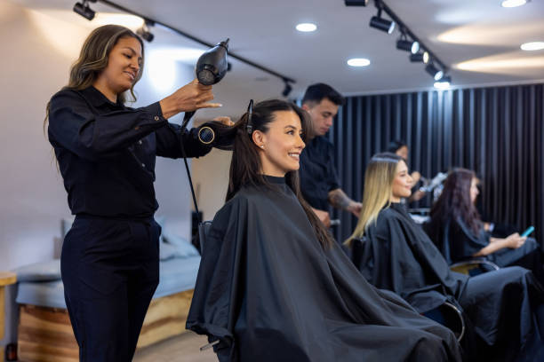 happy customers at the hair salon - hairstyle stock pictures, royalty-free photos & images