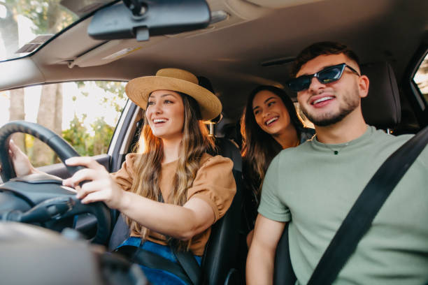 happy friends traveling by car - travel stock pictures, royalty-free photos & images