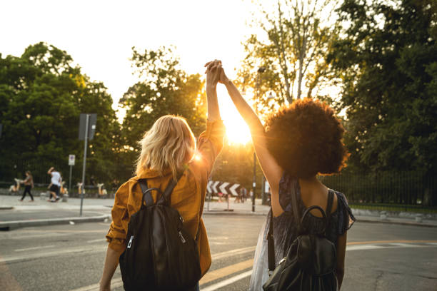 happy girls going to a concert in milano - concert stock pictures, royalty-free photos & images