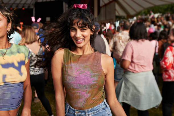 happy woman enjoying dance at music concert - concert stock pictures, royalty-free photos & images