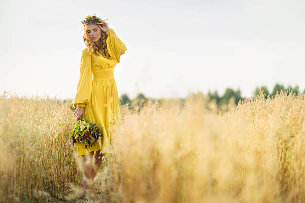 happy woman in fields - fashion stock pictures, royalty-free photos & images