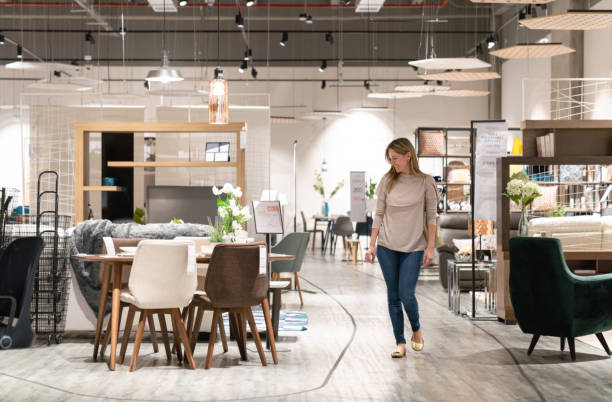 happy woman shopping at a furniture store - home decoration stock pictures, royalty-free photos & images