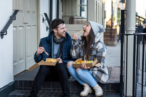 having fun with lunch - junk food stock pictures, royalty-free photos & images