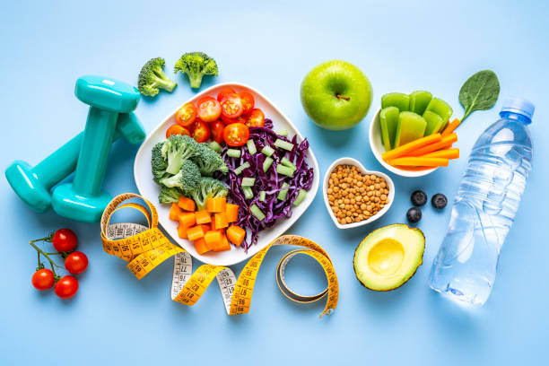 healthy eating and exercising concept. - food stock pictures, royalty-free photos & images