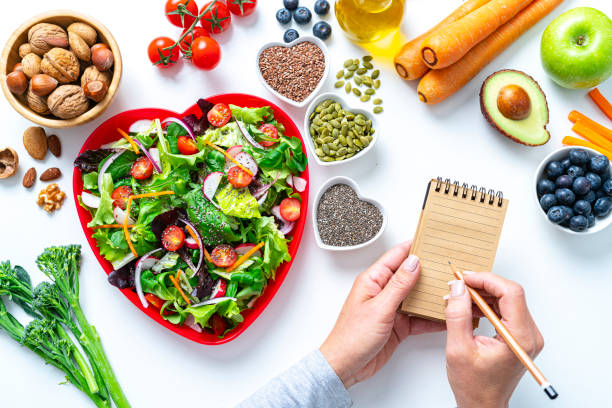 healthy fruits and vegetables salad recipe - food stock pictures, royalty-free photos & images
