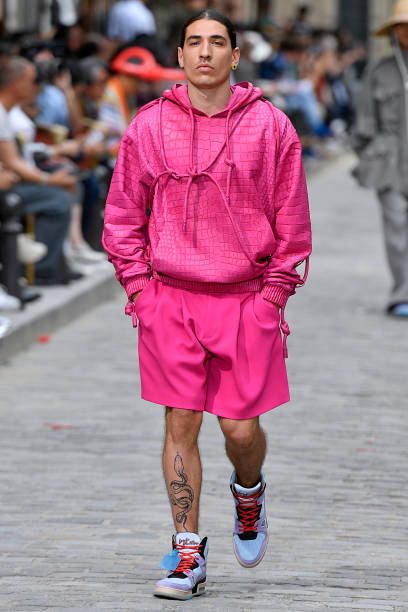 Hector Bellerin walks the runway during the Louis Vuitton Menswear Spring Summer 2020 fashion show as part of Paris Fashion Week on June 20, 2019 in...