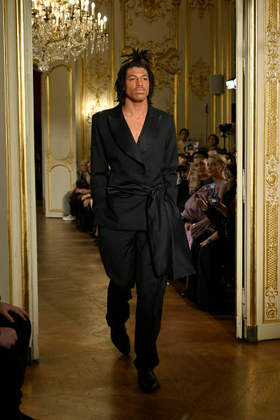 Henry Günther Ademola Dashtu Samuel walks the runway during the Lena Erziak Haute Couture Spring-Summer 2025 show as part of Paris Fashion Week at...