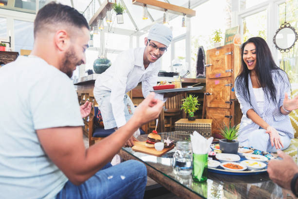 here is your order sir - junk food stock pictures, royalty-free photos & images