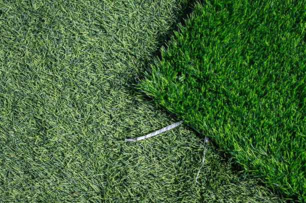 high angle view of unfinished green artificial turf used for covering sport arena or garden. - garden decoration stock pictures, royalty-free photos & images