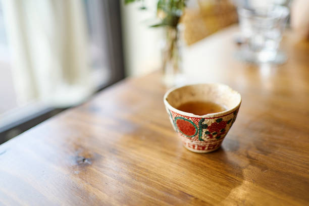 hojicha tea on a table at a vegan café. - home decoration stock pictures, royalty-free photos & images