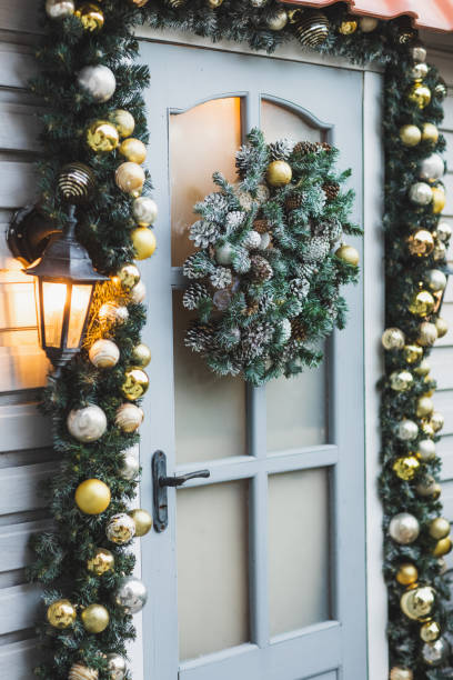 home decorated for christmas holidays with wreath trees, ornaments and garlands. - home decoration stock pictures, royalty-free photos & images