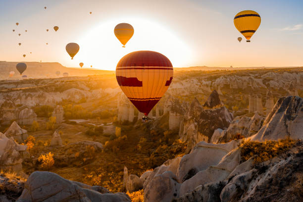 hot air balloons at love valley in cappadocia - travel stock pictures, royalty-free photos & images