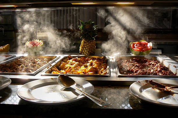 hot food from a tropical buffet - food stock pictures, royalty-free photos & images